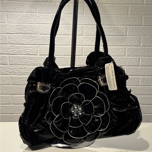 Elegant Black Floral Shoulder Bag with Artistic Design - Picture 1 of 2